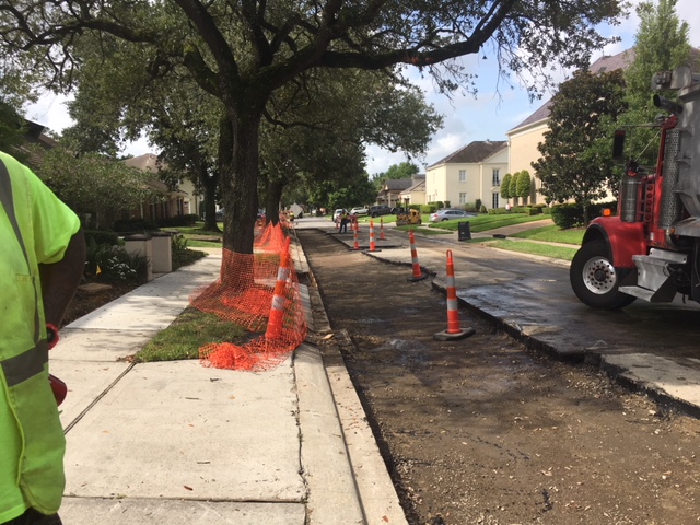 CREWS BEGIN PAVEMENT RESTORATION AFTER COMPLETING WATERLINE REPLACEMENTS ON SOME STREETS IN LAKEWOOD GROUP A