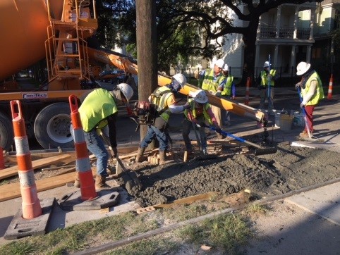 CREWS SET TO BEGIN FORMING AND POURING AMERICANS WITH DISABILITIES ACT-COMPLIANT RAMPS ON ST. CHARLES AVENUE