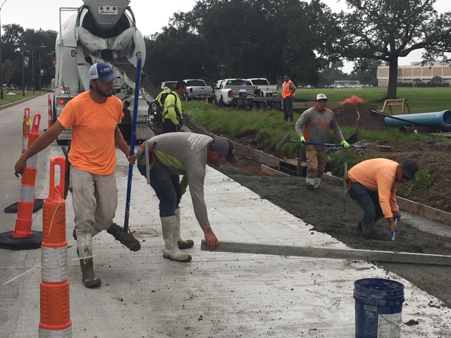 LAKE TERRACE CONTRACTORS EXPEDITE SIDEWALK REPAIRS IN ADVANCE OF HOLIDAY