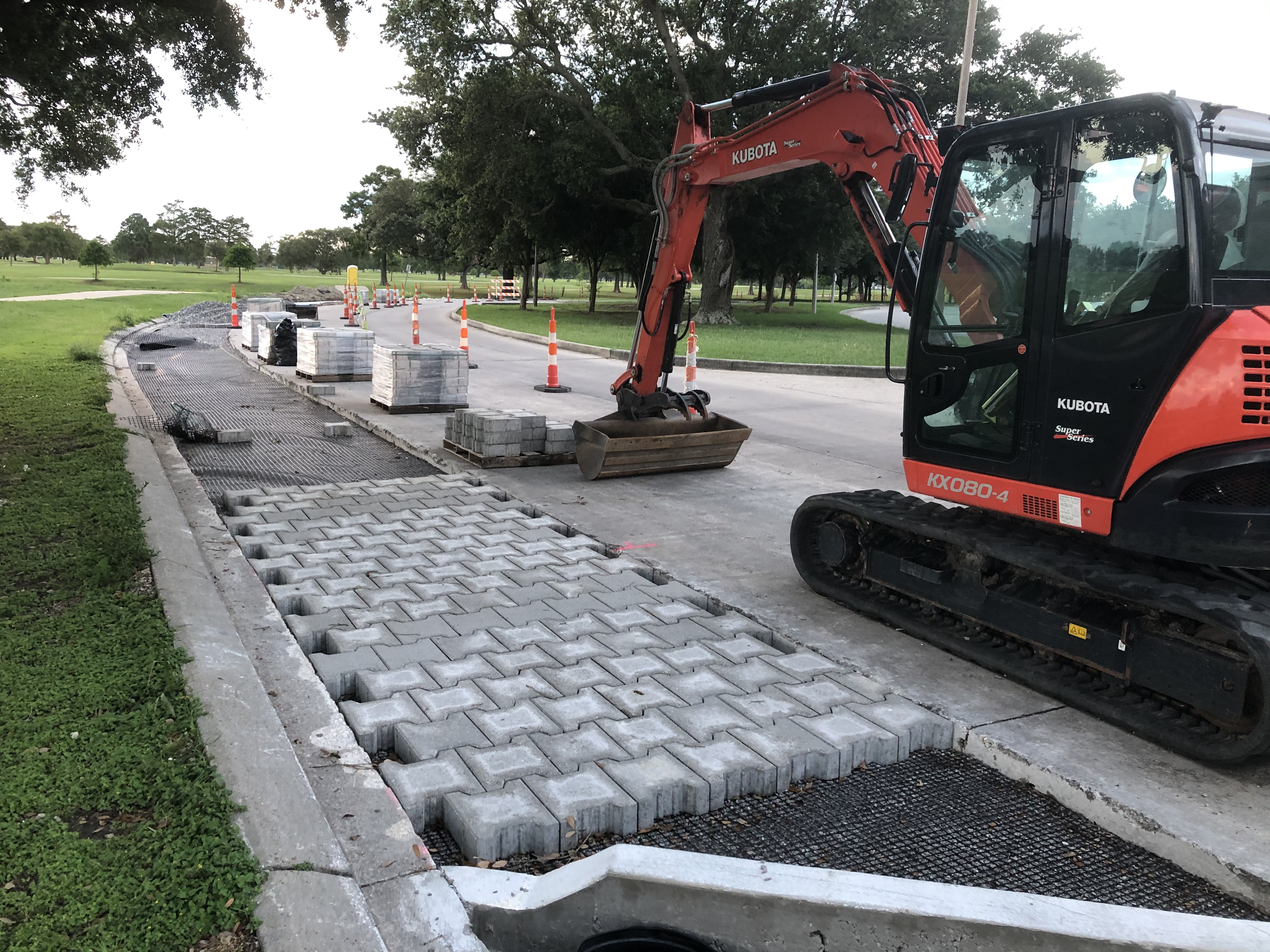 SEMIPERMEABLE PAVERS BEING ASSEMBLED NEAR SUNO IN PONTILLY NETWORK