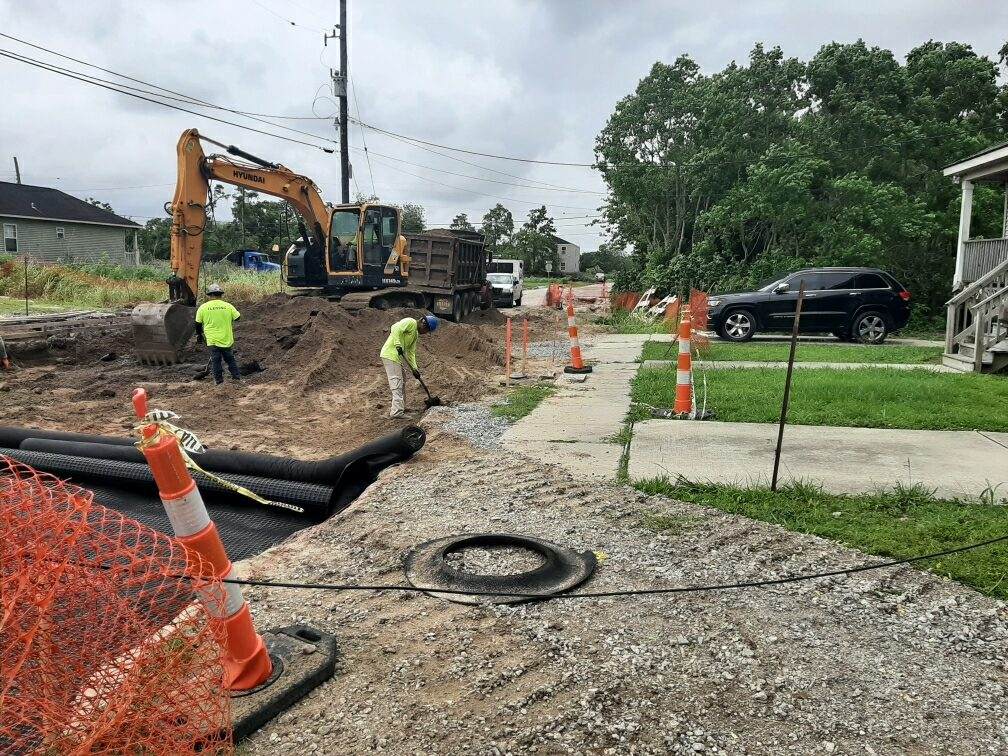 CREWS BEGIN PAVING OPERATIONS ON THE LOWER NINTH WARD SOUTH GROUP A